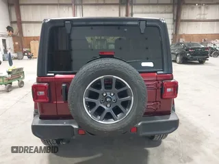 2021 Jeep Wrangler Unlimited Sport S with VIN 1C4HJXDN1MW596334, listed as a IAAI auction lot 41730278 with 64,126 mi miles and . Bid and sale history available at DreamBid. Image 17.