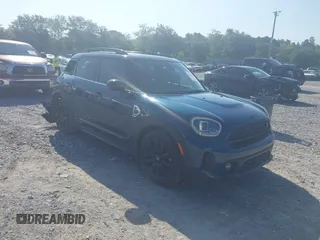 2022 MINI Countryman Cooper S z VIN WMZ53BR02N3N36112, wystawiony jako IAAI lot #42561840 z przebiegiem 60 479 mil mil oraz . Historia ofert i sprzedaży dostępna na DreamBid. Obrazek 1.