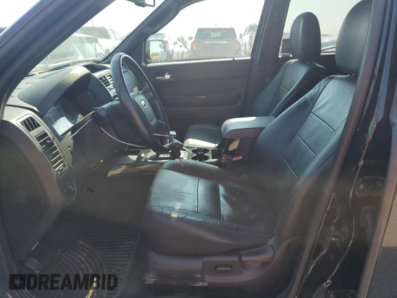2010 Ford Escape Limited z VIN 1FMCU9E74AKC63136, wystawiony jako Copart lot #62388655 z przebiegiem 156 914 mil mil oraz Szkoda całkowita • Salvage title. Historia ofert i sprzedaży dostępna na DreamBid. Obrazek 7.