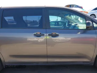 2012 Toyota Sienna with VIN 5TDZK3DC9CS261944, listed as a IAAI auction lot 41885359 with 184,918 mi miles. Bid and sale history available at carsss.com. Image 14.