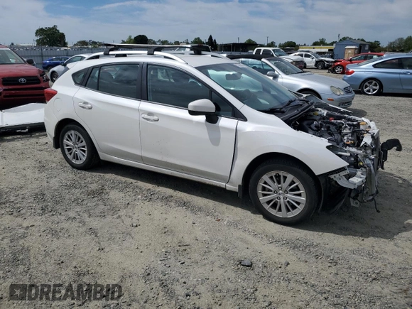 2017 Subaru Impreza Premium with VIN 4S3GTAB6XH3725774, listed as a Copart auction lot 52583855 with 45,258 mi miles and Salvage title. Bid and sale history available at DreamBid. Image 4.