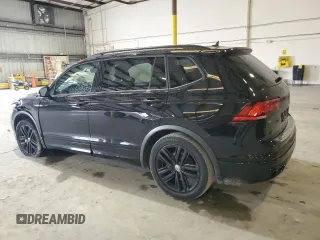 2022 Volkswagen Tiguan SE R-Line Black with VIN 3VVCB7AX1NM140818, listed as a Copart auction lot 71376004 with 29,190 mi miles and Salvage title. Bid and sale history available at DreamBid. Image 2.