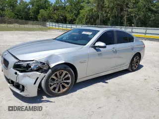 2014 BMW 5 Series 528i with VIN WBA5A5C58ED509788, listed as a Copart auction lot 52584705 with 170,679 mi miles and Salvage Title. Bid and sale history available at carsss.com. Image 1.