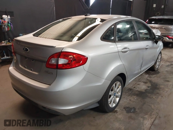 2012 Ford Fiesta SE with VIN 3FADP4BJ1CM110315, listed as a IAAI auction lot 39266357 with 144,749 mi miles. Bid and sale history available at carsss.com. Image 4.