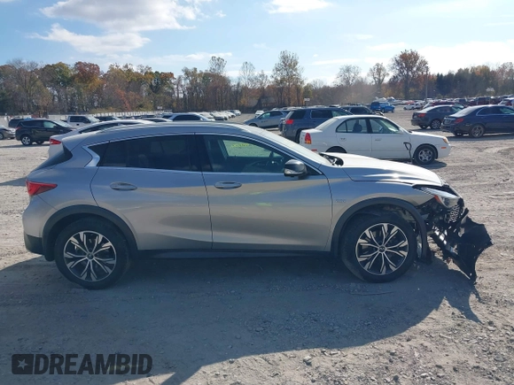 2019 Infiniti QX30 Luxe with VIN SJKCH5CRXKA011966, listed as a IAAI auction lot 40800082 with 56,138 mi miles and . Bid and sale history available at DreamBid. Image 13.