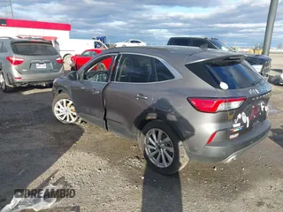 2021 Ford Escape Titanium Hybrid z VIN 1FMCU0DZ0MUB00944, wystawiony jako IAAI lot #41202146 z przebiegiem 52 458 mil mil oraz . Historia ofert i sprzedaży dostępna na DreamBid. Obrazek 3.
