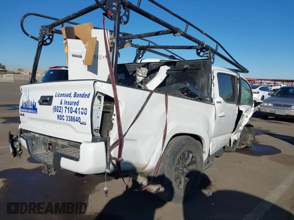 2022 Toyota Tacoma SR with VIN 3TMCZ5AN3NM456220, listed as a IAAI auction lot 41286882 with Not provided miles and . Bid and sale history available at DreamBid. Image 4.