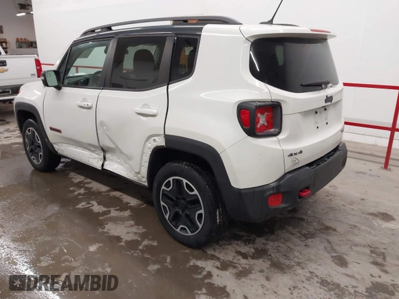 2015 Jeep Renegade Trailhawk with VIN ZACCJBCT2FPC33277, listed as a IAAI auction lot 41571863 with 98,912 mi miles and . Bid and sale history available at DreamBid. Image 3.