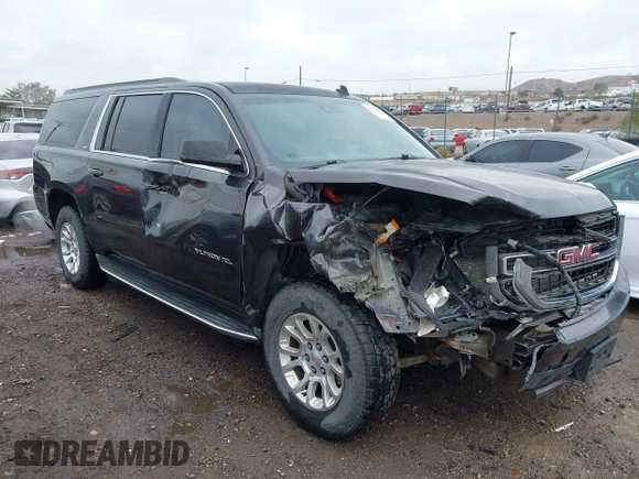 2015 GMC Yukon XL SLT with VIN 1GKS1HKC8FR219289, listed as a IAAI auction lot 40772496 with 163,477 mi miles. Bid and sale history available at carsss.com. Image 13.