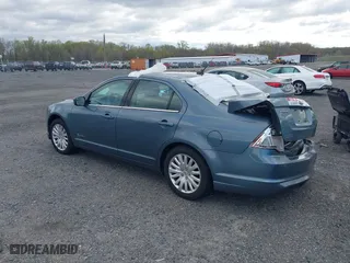 2011 Ford Fusion Hybrid with VIN 3FADP0L39BR264412, listed as a IAAI auction lot 42038511 with 134,166 mi miles. Bid and sale history available at carsss.com. Image 3.