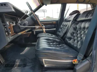 1985 Cadillac Seville z VIN 1G6KS6985FE825187, wystawiony jako Copart lot #54197375 z przebiegiem 2706 mil mil oraz Tytuł czysty. Historia ofert i sprzedaży dostępna na DreamBid. Obrazek 7.