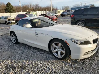 2012 BMW Z4 sDrive28i with VIN WBALL5C59CJ103051, listed as a Copart auction lot 87015834 with 92,071 mi miles and Salvage title. Bid and sale history available at DreamBid. Image 4.