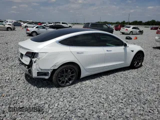 2019 Tesla Model 3 Long Range with VIN 5YJ3E1EB2KF391185, listed as a Copart auction lot 54151155 with 68,088 mi miles and Salvage Title. Bid and sale history available at carsss.com. Image 3.