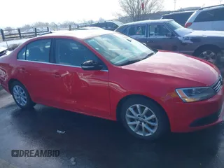 2014 Volkswagen Jetta Sedan SE w/Connectivity with VIN 3VWD07AJ7EM288652, listed as a IAAI auction lot 41630616 with 130,860 mi miles. Bid and sale history available at carsss.com. Image 13.