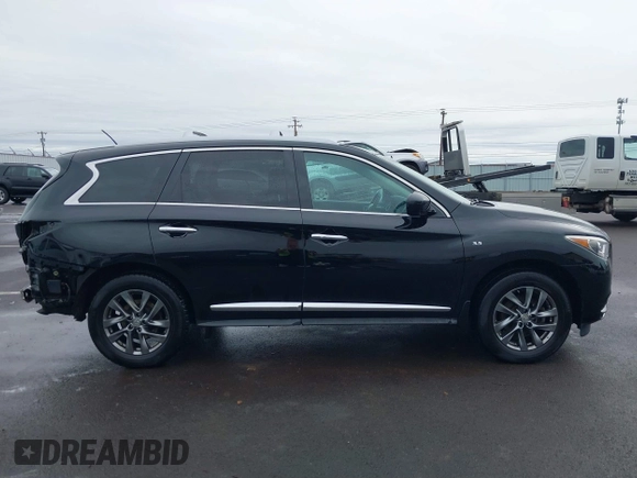 2015 Infiniti QX60 with VIN 5N1AL0MM6FC541422, listed as a IAAI auction lot 41484158 with 160,616 mi miles and . Bid and sale history available at DreamBid. Image 14.