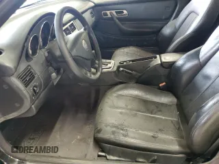 2001 Mercedes-Benz SLK 230 Kompressor с VIN WDBKK49F31F232414, выставлен на аукционе Copart как лот 78304774 с пробегом Не указан миль и Списание • Salvage title. История ставок и продаж доступна на DreamBid. Изображение 7.