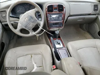 2004 Hyundai Sonata GLS with VIN KMHWF35H74A029127, listed as a Copart auction lot 76701124 with 0 mi miles and Salvage Title. Bid and sale history available at carsss.com. Image 8.