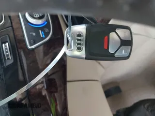 2019 Audi Q7 Premium Plus z VIN WA1LAAF71KD031123, wystawiony jako IAAI lot #41953574 z przebiegiem 48 999 mil mil oraz . Historia ofert i sprzedaży dostępna na DreamBid. Obrazek 11.