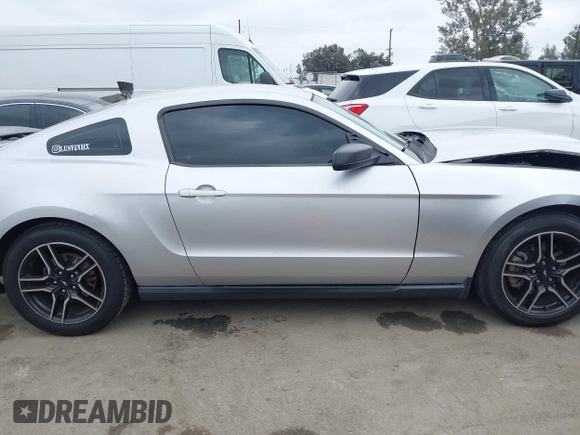 2012 Ford Mustang V6 Premium with VIN 1ZVBP8AM6C5211339, listed as a IAAI auction lot 42107541 with 164,678 mi miles. Bid and sale history available at carsss.com. Image 13.