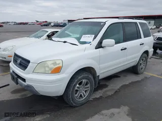 2004 Honda Pilot EX with VIN 2HKYF18464H503605, listed as a IAAI auction lot 41373673 with 112,919 mi miles. Bid and sale history available at carsss.com. Image 2.
