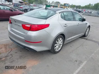 2015 Kia Optima EX with VIN 5XXGN4A70FG422277, listed as a IAAI auction lot 41932887 with 150,386 mi miles. Bid and sale history available at carsss.com. Image 4.