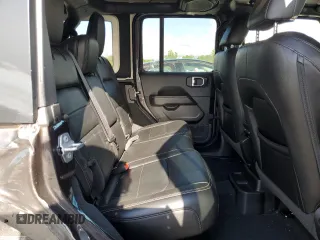 2022 Jeep Wrangler Unlimited Sahara z VIN 1C4HJXEN0NW110192, wystawiony jako Copart lot #57206625 z przebiegiem 32 964 mil mil oraz Szkoda całkowita • Salvage title. Historia ofert i sprzedaży dostępna na DreamBid. Obrazek 11.