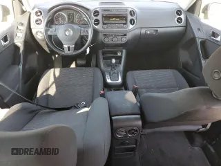 2014 Volkswagen Tiguan SE z VIN WVGAV3AX3EW512497, wystawiony jako Copart lot #43221255 z przebiegiem 94 633 mil mil oraz Szkoda całkowita • Salvage title. Historia ofert i sprzedaży dostępna na DreamBid. Obrazek 8.