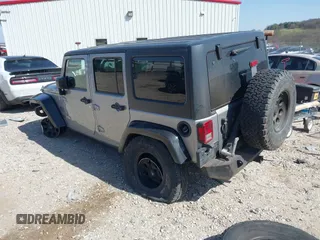 2015 Jeep Wrangler Unlimited Sport z VIN 1C4BJWDG0FL745533, wystawiony jako IAAI lot #41844126 z przebiegiem 151 620 mil mil oraz . Historia ofert i sprzedaży dostępna na DreamBid. Obrazek 3.