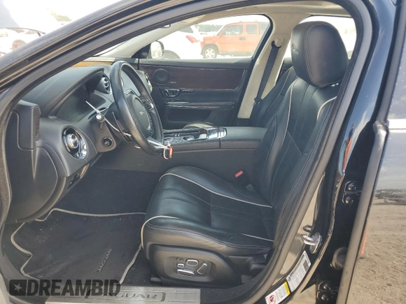 2014 Jaguar XJ with VIN SAJWA2GT0EMV61531, listed as a Copart auction lot 61071054 with 79,266 mi miles and Clean Title. Bid and sale history available at DreamBid. Image 7.