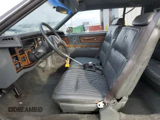 1984 Cadillac Eldorado z VIN 1G6AL5781EE619594, wystawiony jako Copart lot #80918934 z przebiegiem 47 529 mil mil oraz Szkody całkowita. Historia ofert i sprzedaży dostępna na DreamBid. Obrazek 7.