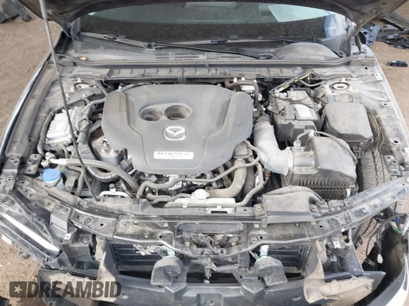 2023 Mazda 3 Premium Plus with VIN 3MZBPBEY6PM350056, listed as a IAAI auction lot 41940111 with 27,091 mi miles and . Bid and sale history available at DreamBid. Image 10.
