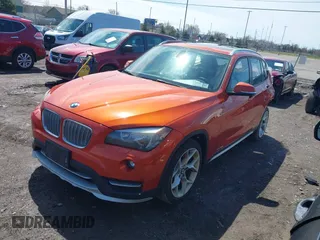 2015 BMW X1 xDrive28i with VIN WBAVL1C57FVY27822, listed as a IAAI auction lot 41977545 with 76,211 mi miles. Bid and sale history available at carsss.com. Image 2.