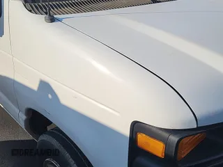 2013 Ford Econoline Cargo Commercial z VIN 1FTNE1EW1DDA61995, wystawiony jako IAAI lot #42516622 z przebiegiem 182 503 mil mil oraz . Historia ofert i sprzedaży dostępna na DreamBid. Obrazek 31.