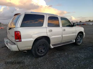 2004 Cadillac Escalade z VIN 1GYEK63N64R200175, wystawiony jako Copart lot #86566364 z przebiegiem Nie podano mil oraz Szkoda całkowita • Salvage title. Historia ofert i sprzedaży dostępna na DreamBid. Obrazek 3.