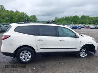 2015 Chevrolet Traverse LS z VIN 1GNKVFED4FJ197970, wystawiony jako IAAI lot #42020771 z przebiegiem 128 876 mil mil oraz . Historia ofert i sprzedaży dostępna na DreamBid. Obrazek 13.