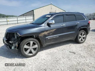 2014 Jeep Grand Cherokee Limited z VIN 1C4RJFBG1EC379601, wystawiony jako Copart lot #52445245 z przebiegiem 153 411 mil mil oraz Szkoda całkowita • Salvage title. Historia ofert i sprzedaży dostępna na DreamBid. Obrazek 1.