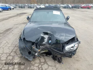 2011 BMW 1 Series 135i с VIN WBAUN7C50BVM25336, выставлен на аукционе IAAI как лот 41720402 с пробегом Не указан миль и . История ставок и продаж доступна на DreamBid. Изображение 12.