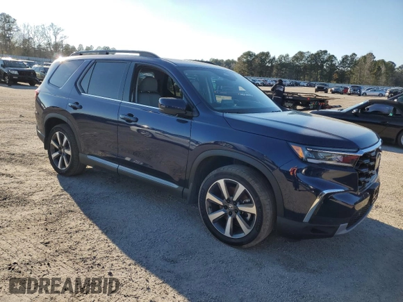 2023 Honda Pilot Touring with VIN 5FNYG2H73PB007631, listed as a Copart auction lot 82382153 with 6,050 mi miles. Bid and sale history available at carsss.com. Image 4.