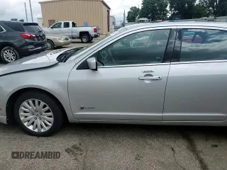 2010 Ford Fusion Hybrid with VIN 3FADP0L33AR140229, listed as a Copart auction lot 63084475 with 164,313 mi miles and Salvage title. Bid and sale history available at DreamBid. Image 13.