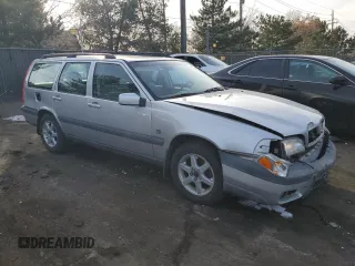 1999 Volvo V70 XC with VIN YV1LZ56D7X2617561, listed as a Copart auction lot 84968394 with 164,035 mi miles and Salvage Title. Bid and sale history available at carsss.com. Image 4.