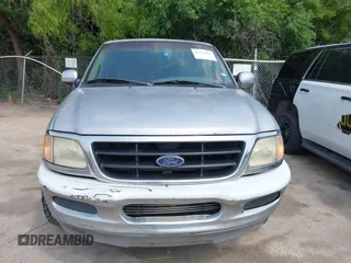 1999 Ford F-150 with VIN 1FTRX17W7XKB20640, listed as a IAAI auction lot 42273497 with 250,232 mi miles and . Bid and sale history available at DreamBid. Image 6.