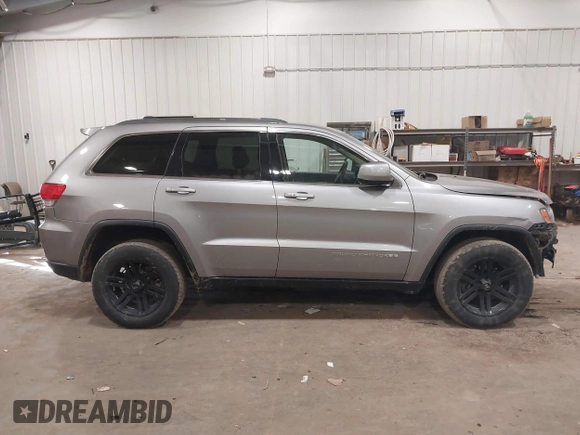 2015 Jeep Grand Cherokee Laredo with VIN 1C4RJFAG4FC797069, listed as a IAAI auction lot 41435299 with 146,755 mi miles. Bid and sale history available at carsss.com. Image 13.