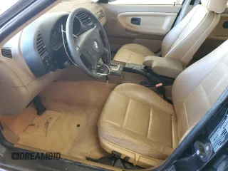 1997 BMW 3 Series 328iA with VIN WBACD432XVAV46101, listed as a Copart auction lot 88912345 with 149,163 mi miles and Salvage Title. Bid and sale history available at carsss.com. Image 7.