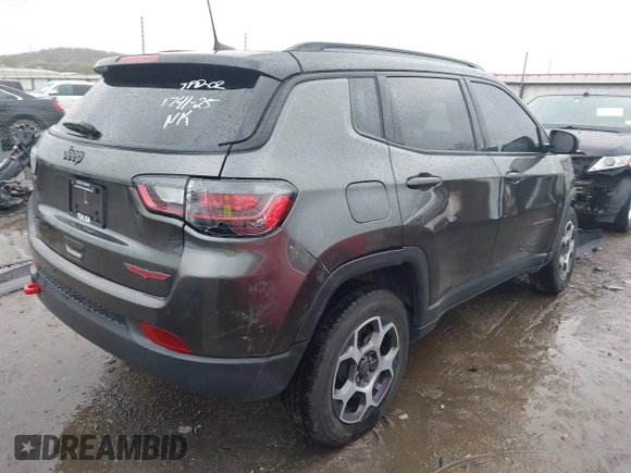 2022 Jeep Compass Trailhawk with VIN 3C4NJDDBXNT206118, listed as a IAAI auction lot 41945077 with 7,785 mi miles and . Bid and sale history available at DreamBid. Image 4.