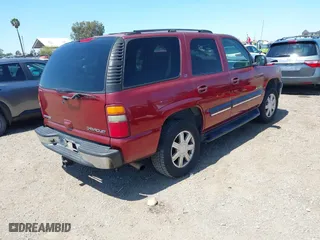 2001 Chevrolet Tahoe LT with VIN 1GNEC13T01R218517, listed as a IAAI auction lot 41979136 with 291,164 mi miles. Bid and sale history available at carsss.com. Image 4.