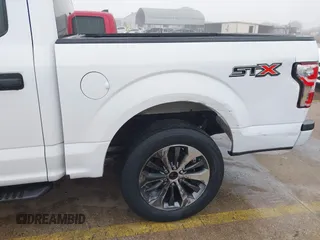 2019 Ford F-150 XL with VIN 1FTEW1C45KKE59914, listed as a IAAI auction lot 41442014 with 98,445 mi miles and . Bid and sale history available at DreamBid. Image 6.