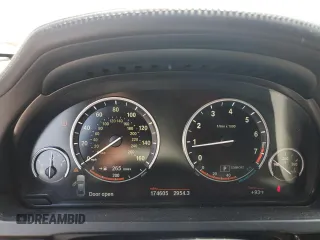 2011 BMW 7 Series 750i with VIN WBAKA8C59BCY36657, listed as a Copart auction lot 61484925 with 174,605 mi miles and Salvage title. Bid and sale history available at DreamBid. Image 9.