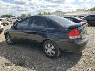 2009 Kia Spectra EX with VIN KNAFE221295624733, listed as a Copart auction lot 72229664 with 115,179 mi miles and Salvage Title. Bid and sale history available at carsss.com. Image 2.