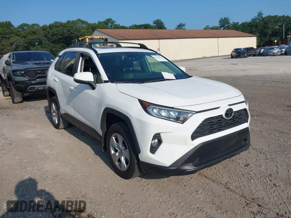 2019 Toyota RAV4 XLE with VIN JTMP1RFV0KD020442, listed as a IAAI auction lot 40108049 with 70,916 mi miles and . Bid and sale history available at DreamBid. Image 1.