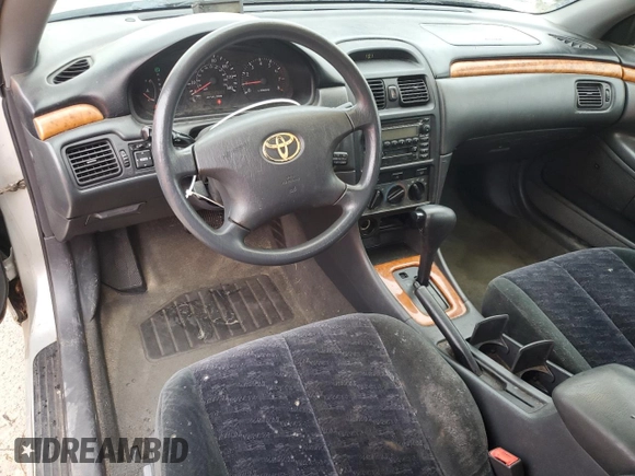 2002 Toyota Solara SE z VIN 2T1CE22P92C015724, wystawiony jako Copart lot #55807945 z przebiegiem 401 766 mil mil oraz Szkoda całkowita • Salvage title. Historia ofert i sprzedaży dostępna na DreamBid. Obrazek 8.